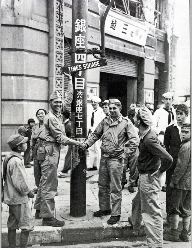 October 7, 1945
Marines hold up Times Square sign in front of Mitsukoshi in Ginza 4-chome